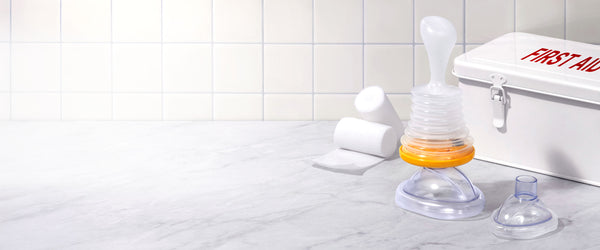 LifeVac in front of First Aid Kit and gauze